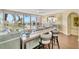 Bright living room with water view and bar seating at 5155 S Isla Key S Blvd # 202, St Petersburg, FL 33715