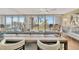 Living room with water view and breakfast bar at 5155 S Isla Key S Blvd # 202, St Petersburg, FL 33715