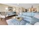 Comfortable living room features stylish decor, an airy feel and seamlessly connecting to the dining area at 5155 S Isla Key S Blvd # 202, St Petersburg, FL 33715