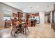 Open-concept kitchen and dining area is great for Gathering and entertaining guests at 714 Sugar Camp Way, Brooksville, FL 34604