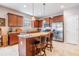 Spacious kitchen with granite counters, stainless steel appliances, and a functional island for cooking and gathering at 714 Sugar Camp Way, Brooksville, FL 34604