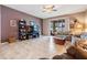 Comfortable living room with sliding door to screened in patio and decorative furnishings at 714 Sugar Camp Way, Brooksville, FL 34604
