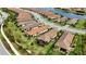 Aerial view of houses and green spaces in a residential community at 11111 Callisia Dr, Odessa, FL 33556