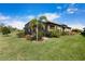 Screened patio and landscaped backyard at 11111 Callisia Dr, Odessa, FL 33556