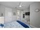 Spacious bedroom with a queen bed and ensuite bathroom access at 11111 Callisia Dr, Odessa, FL 33556