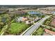 Resort-style community pool, tennis courts, and clubhouse at 11111 Callisia Dr, Odessa, FL 33556