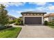 Attached garage with paver driveway at 11111 Callisia Dr, Odessa, FL 33556