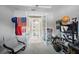Bright home office features built-in shelving and opens to a full bathroom at 11111 Callisia Dr, Odessa, FL 33556