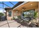 Outdoor patio with seating area and adjacent to the house at 11111 Callisia Dr, Odessa, FL 33556