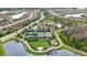 Aerial view of tennis courts, playground, and walking paths at 11111 Callisia Dr, Odessa, FL 33556