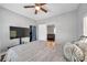 Main bedroom with TV and access to other rooms at 1318 E Louise Ave, Tampa, FL 33603