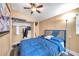 Simple bedroom with a double bed and ceiling fan at 1318 E Louise Ave, Tampa, FL 33603