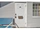 Exterior view of the house featuring front door and mailbox at 1318 E Louise Ave, Tampa, FL 33603