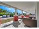 Front porch with seating area and view of the neighborhood at 1318 E Louise Ave, Tampa, FL 33603