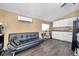 Studio apartment with kitchenette and sofa at 1318 E Louise Ave, Tampa, FL 33603