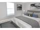 Cozy bedroom with a queen-size bed and modern decor at 17009 Clear Cork Dr, Wimauma, FL 33598
