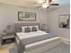 Spacious bedroom with a king-size bed and neutral decor at 17009 Clear Cork Dr, Wimauma, FL 33598