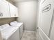 Convenient laundry room with washer and dryer hookups at 17009 Clear Cork Dr, Wimauma, FL 33598