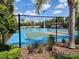 Outdoor pickleball courts with blue surface and fencing at 17009 Clear Cork Dr, Wimauma, FL 33598