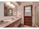 Bathroom with double vanity and separate shower at 1760 Kenesaw Ln, Clearwater, FL 33765