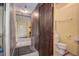 Small bathroom with toilet and sink at 1760 Kenesaw Ln, Clearwater, FL 33765
