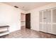 Bedroom with tiled floors and built-in closet at 1760 Kenesaw Ln, Clearwater, FL 33765
