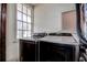 Laundry room with washer and dryer at 1760 Kenesaw Ln, Clearwater, FL 33765