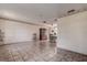Spacious living room with tiled floors and lots of natural light at 1760 Kenesaw Ln, Clearwater, FL 33765