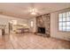 Open living room and kitchen area with tiled floors at 1760 Kenesaw Ln, Clearwater, FL 33765