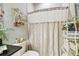Bathroom with shower, toilet, and granite countertop at 23 Concord Dr, Dunedin, FL 34698