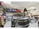 Garage with overhead storage and workshop area at 23 Concord Dr, Dunedin, FL 34698