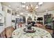 Spacious kitchen with granite countertops, stainless steel appliances, and white cabinetry at 23 Concord Dr, Dunedin, FL 34698