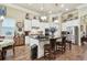 Island kitchen with granite countertops and stainless steel appliances at 23 Concord Dr, Dunedin, FL 34698