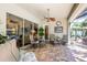 Covered patio with seating area and view of the backyard at 23 Concord Dr, Dunedin, FL 34698
