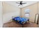 Well-lit bedroom with a bed and a ceiling fan at 2415 10Th E Ave, Palmetto, FL 34221