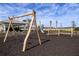 playground with swings and slide at 29571 Velletri Ln, Wesley Chapel, FL 33545
