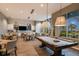 Recreation room with pool table and comfortable seating at 29571 Velletri Ln, Wesley Chapel, FL 33545