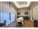 Bright spa room with massage table and natural light at 29571 Velletri Ln, Wesley Chapel, FL 33545