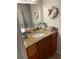 Bathroom with granite countertop and double vanity at 3540 42Nd S St # C, St Petersburg, FL 33711