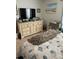 Bedroom with large dresser and TV at 3540 42Nd S St # C, St Petersburg, FL 33711