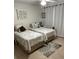 Twin bedroom with beach themed decor at 3540 42Nd S St # C, St Petersburg, FL 33711