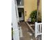 Inviting condo entryway with landscaping and walkway at 3540 42Nd S St # C, St Petersburg, FL 33711