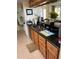 Kitchen with granite countertops and wood cabinets at 3540 42Nd S St # C, St Petersburg, FL 33711