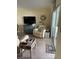 Relaxing living room with recliner and view to patio at 3540 42Nd S St # C, St Petersburg, FL 33711