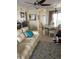 Bright living room features comfy seating and a dining area at 3540 42Nd S St # C, St Petersburg, FL 33711