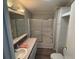 Bathroom with tub, shower, and vanity at 37729 Neukom Ave, Zephyrhills, FL 33541