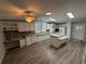 Spacious kitchen featuring an island and modern appliances at 37729 Neukom Ave, Zephyrhills, FL 33541