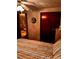 Bedroom with a double bed, closet, and view into living room at 4031 Cluster Dr, Holiday, FL 34691