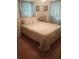 Cozy bedroom with a double bed and ample closet space at 4031 Cluster Dr, Holiday, FL 34691