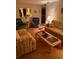 Living room featuring two sofas, end tables, and a coffee table at 4031 Cluster Dr, Holiday, FL 34691